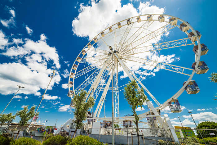 Rimini Ferris wheel over the canal port, in Rimini, Italy shutterstock_432326140.jpg
